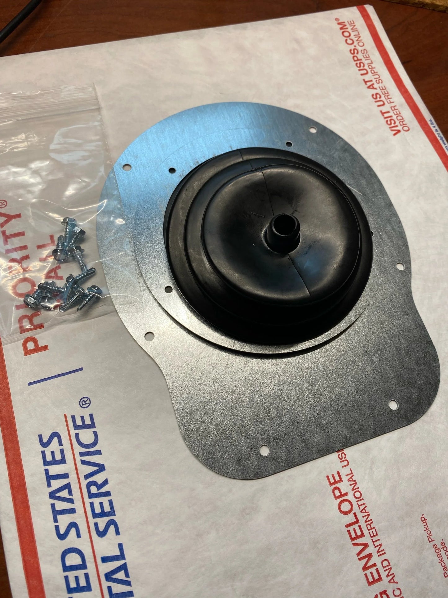 ZJ 5 Speed Dust Boot Kit. Showing supplied hardware and precision laser-cut galvanized steel parts.