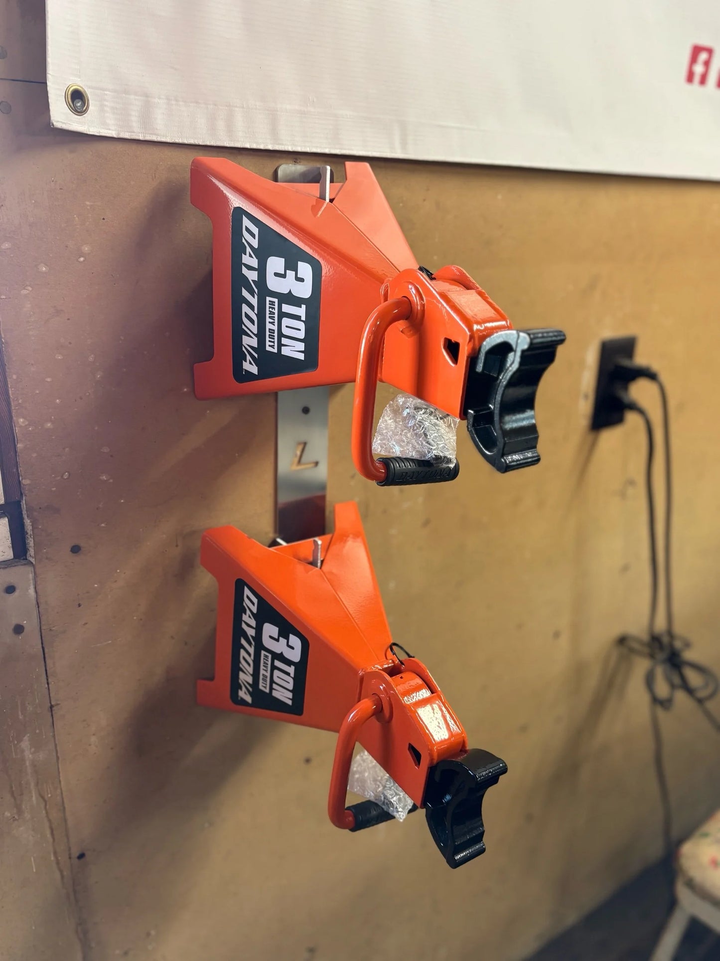 4Link4WD jack stand wall hanger mount holding 3 Ton Daytona jack stands. 