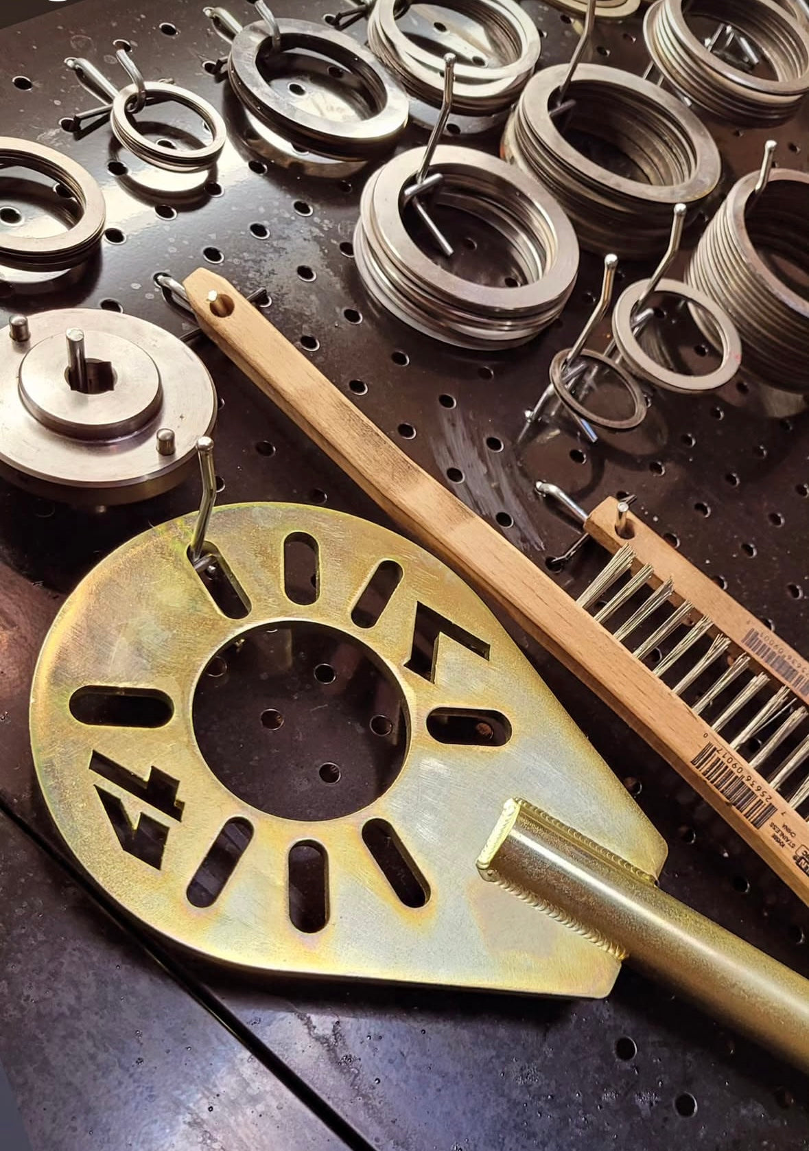 Large 4Link4WD pinion tool hanging with assortment of differential shims.