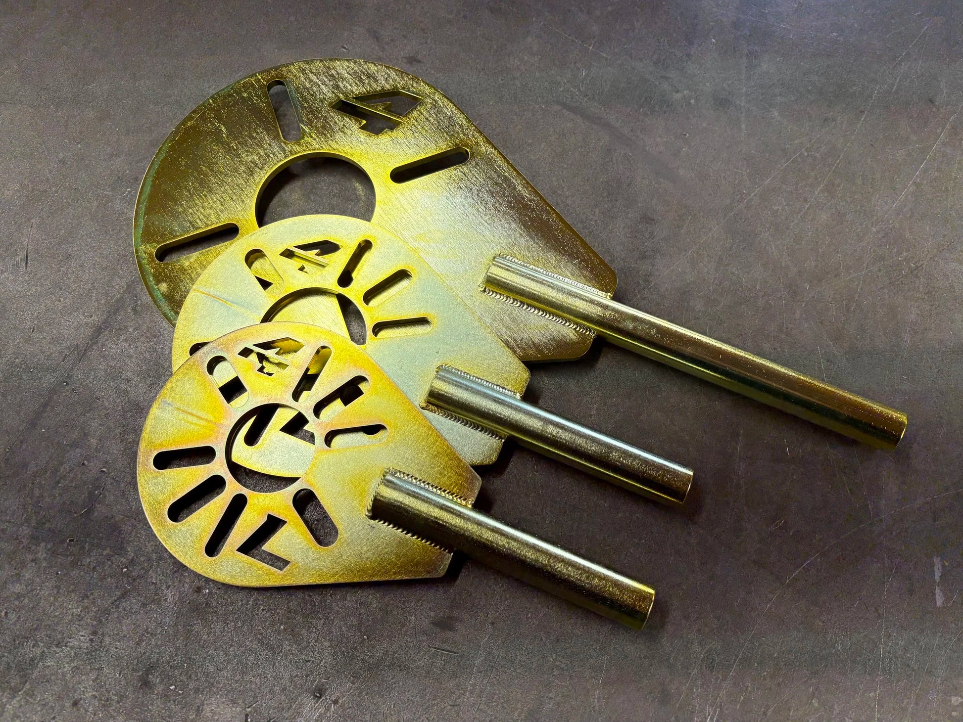 Comparison photo of the 4Link4WD XL pinion tool behind the large and small yoke wrenches. 