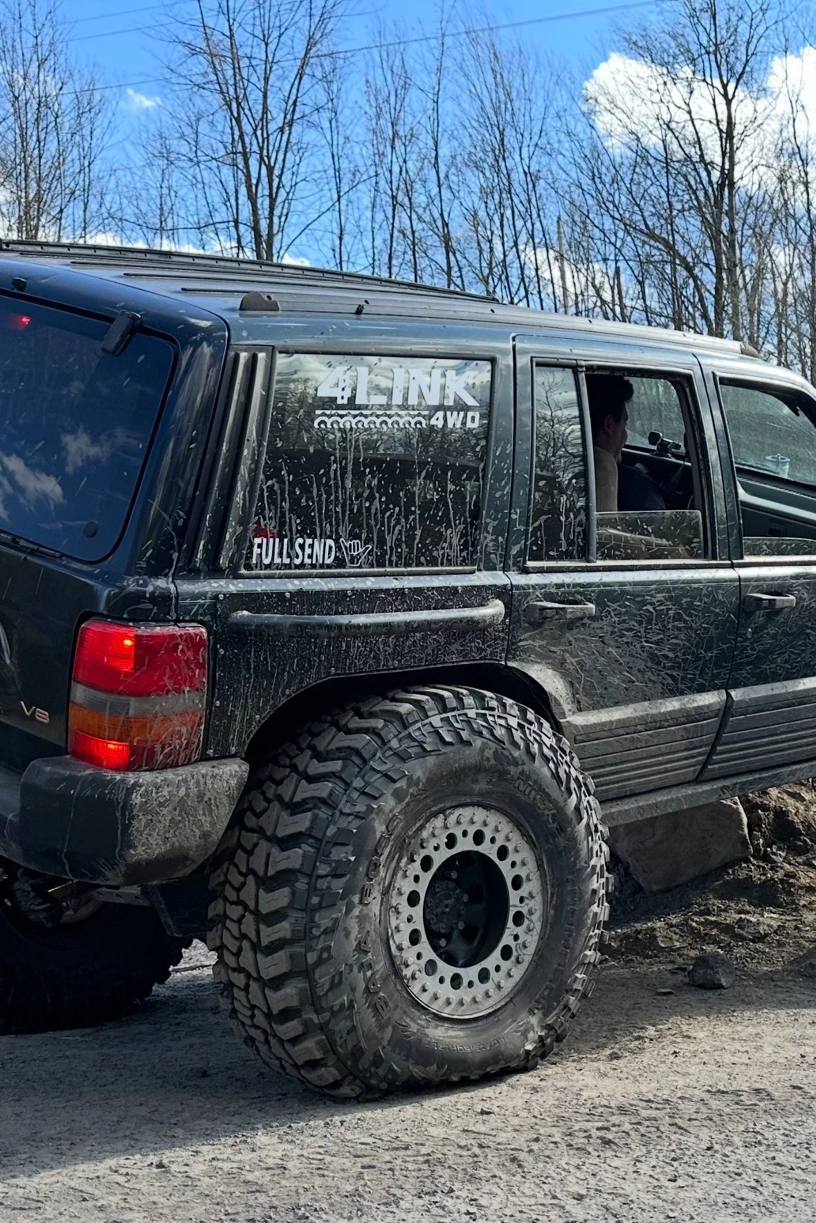 Large white 4Link4WD decal on side of Nick's 1 ton Jeep ZJ.